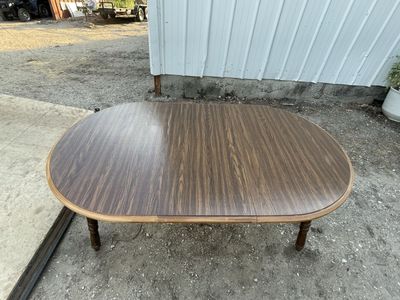 Oval Wood Grain Dining Table with Leaf