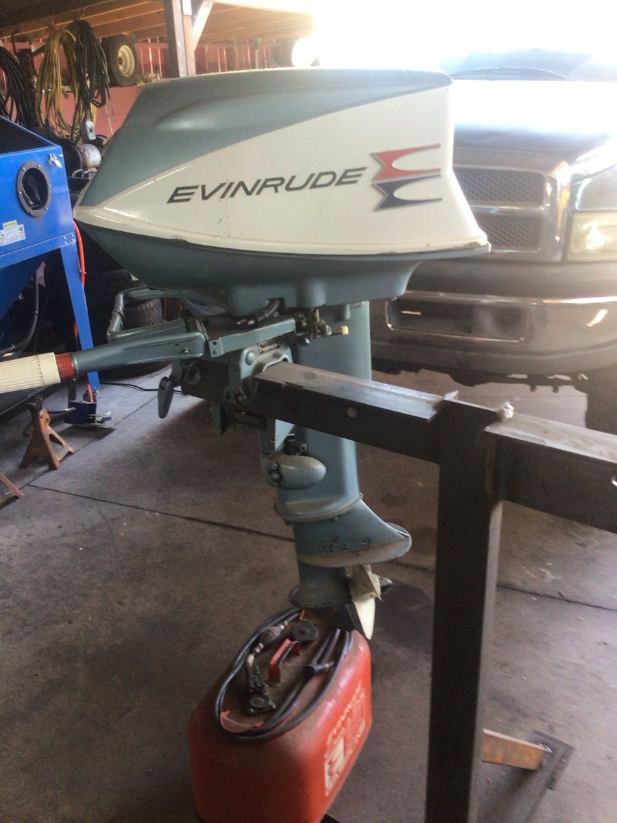 Vintage Evinrude Outboard Boat Motor with Fuel Tank (1960s)