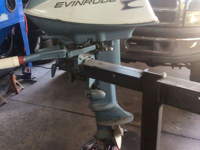 Vintage Evinrude Outboard Boat Motor with Fuel Tank (1960s)