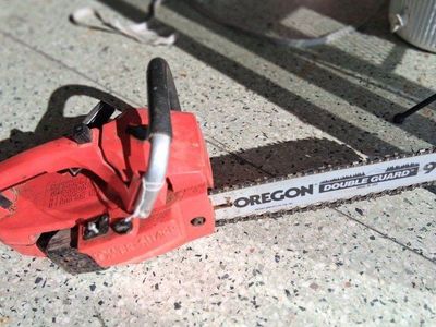 VINTAGE CRAFTMANS CHAIN SAW red