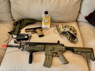 Airsoft rifle-handgun and gear bundle