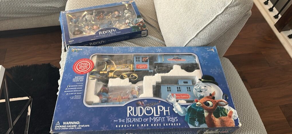 Rudolph And The Island Of Misfits Train And People