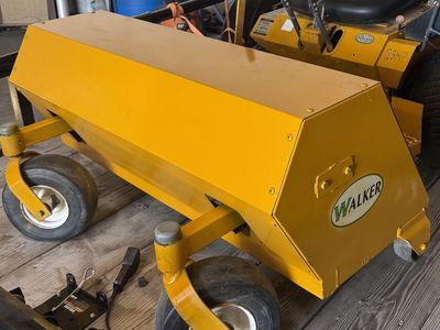 Walker mower Aerator attachment