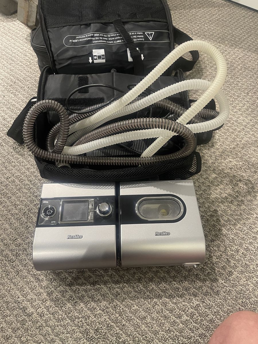 ResMed S9 Elite CPAP machine attached to an H5i Heated Humidifier