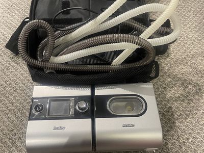 ResMed S9 Elite CPAP machine attached to an H5i Heated Humidifier
