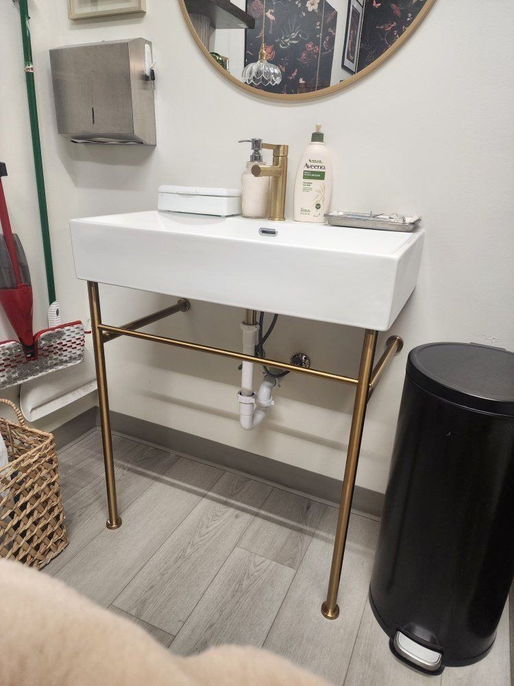 Contemporary White Ceramic Bathroom Sink with Gold Frame Stand and Faucet
