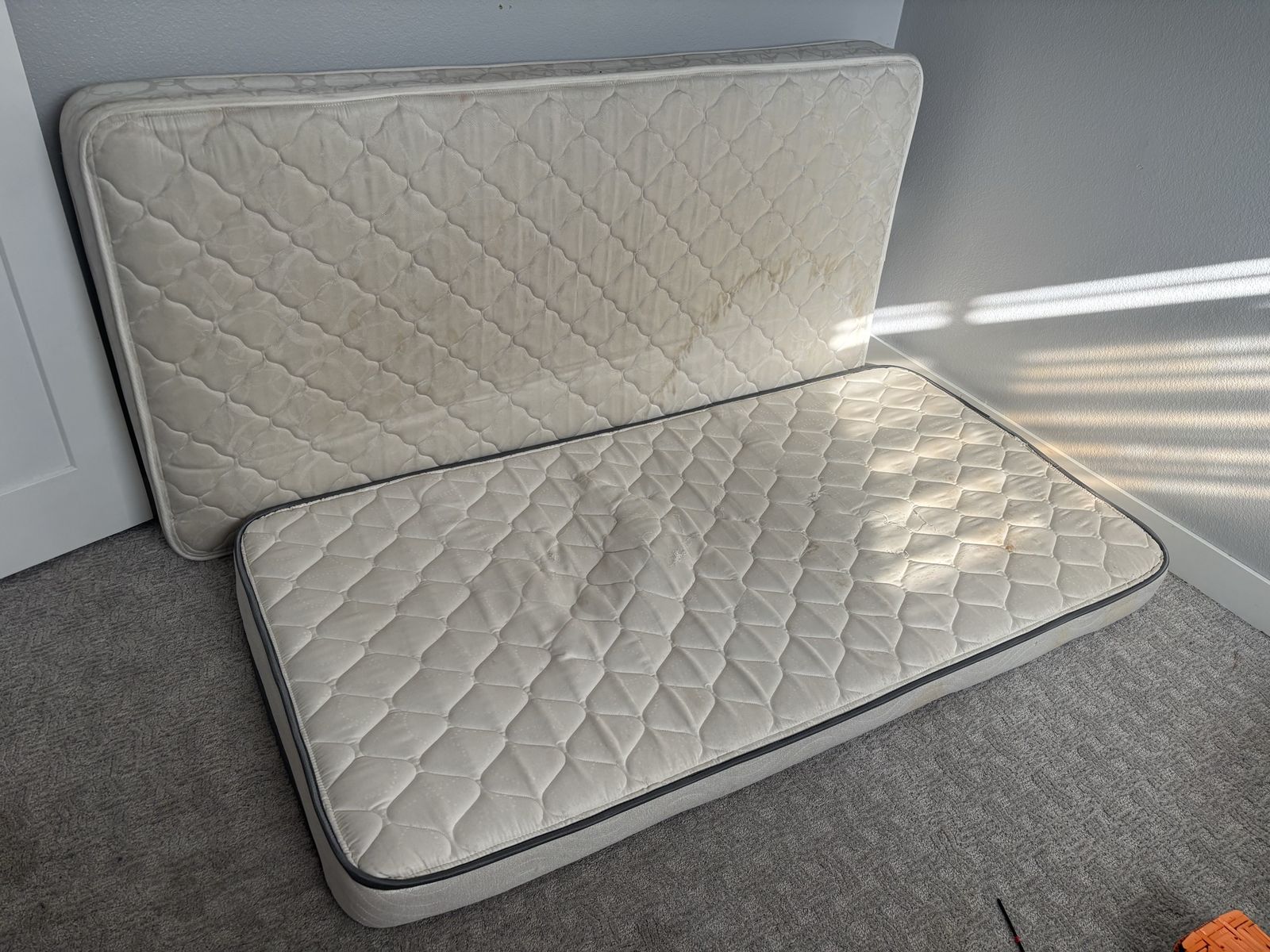 Two twin mattresses