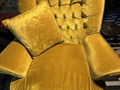 MCM gold velvet swivel armchair