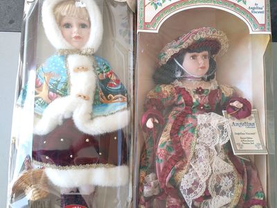 Two Collectable Porcelain Dolls