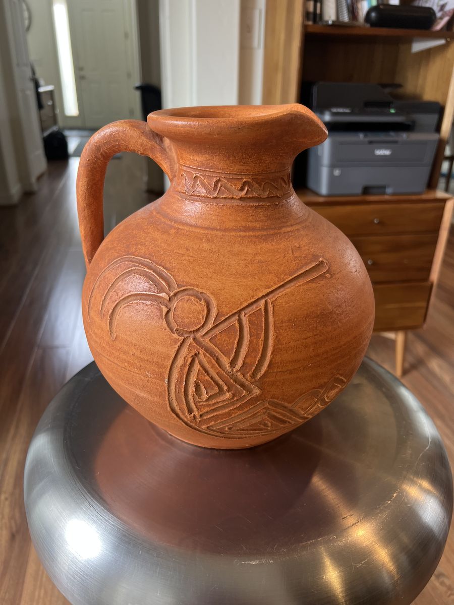 Cute Terra Cotta Jar .