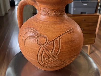 Cute Terra Cotta Jar .