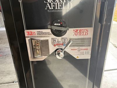 Brand new 32 gun Sports Afield safe