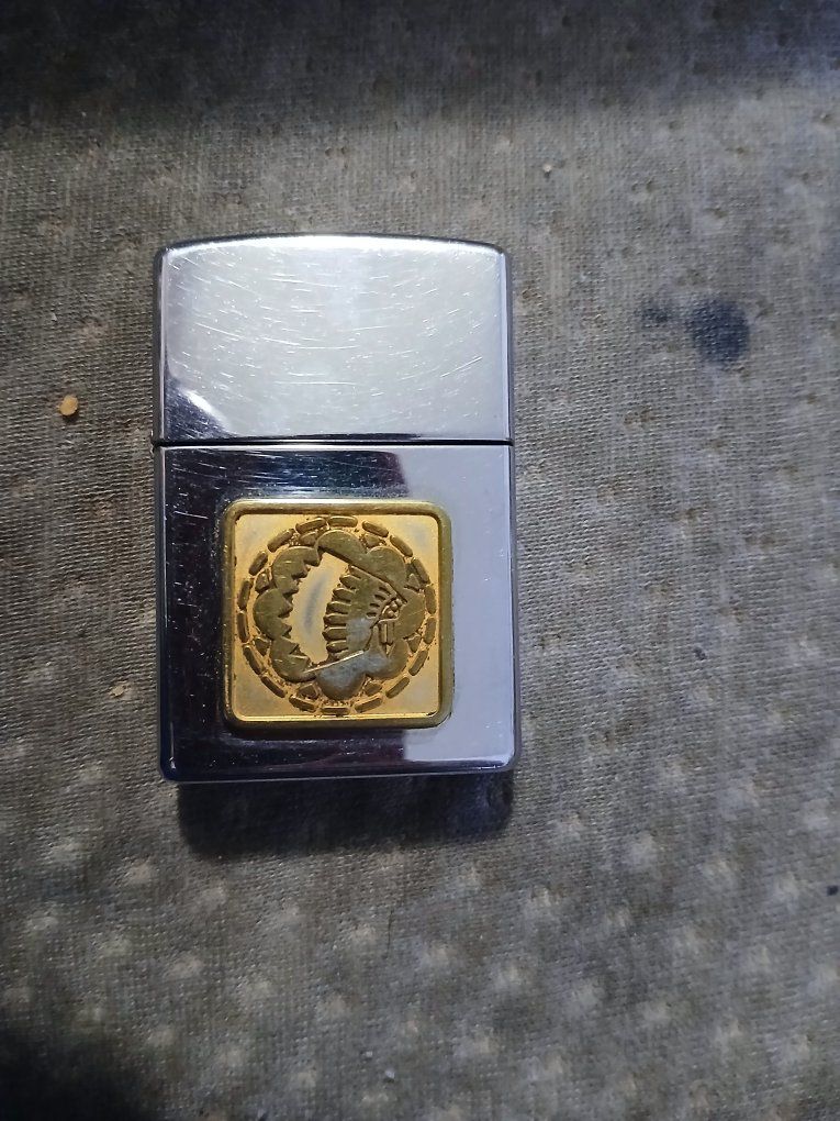 Vintage Chrome Flip Lighter with Gold Native American Chief Emblem