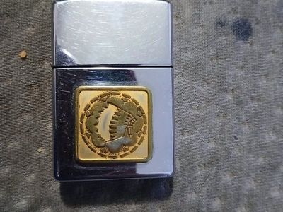 Vintage Chrome Flip Lighter with Gold Native American Chief Emblem