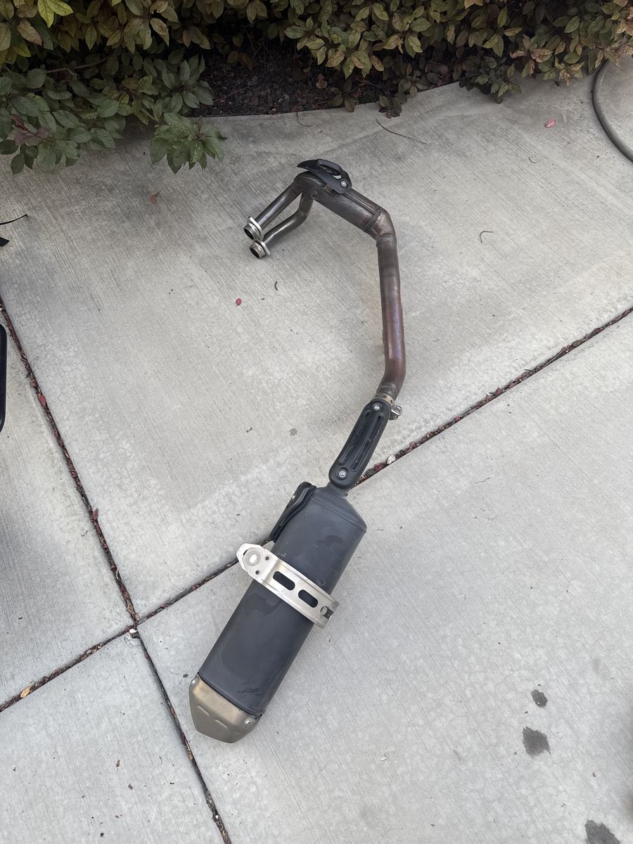 Motorcycle Exhaust Pipe & Muffler Assembly, 2024 Yamaha Tenere 700 with 1,000 miles.