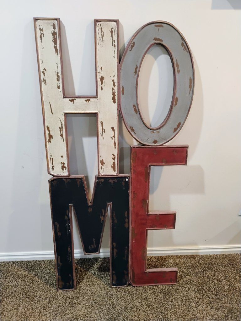 "HOME" rustic wall decor with a distressed finish