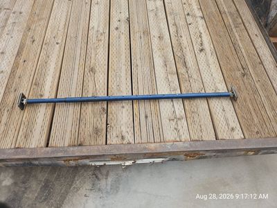 Used adjustable blue telescopic cargo bar or load-lock stabilization pole