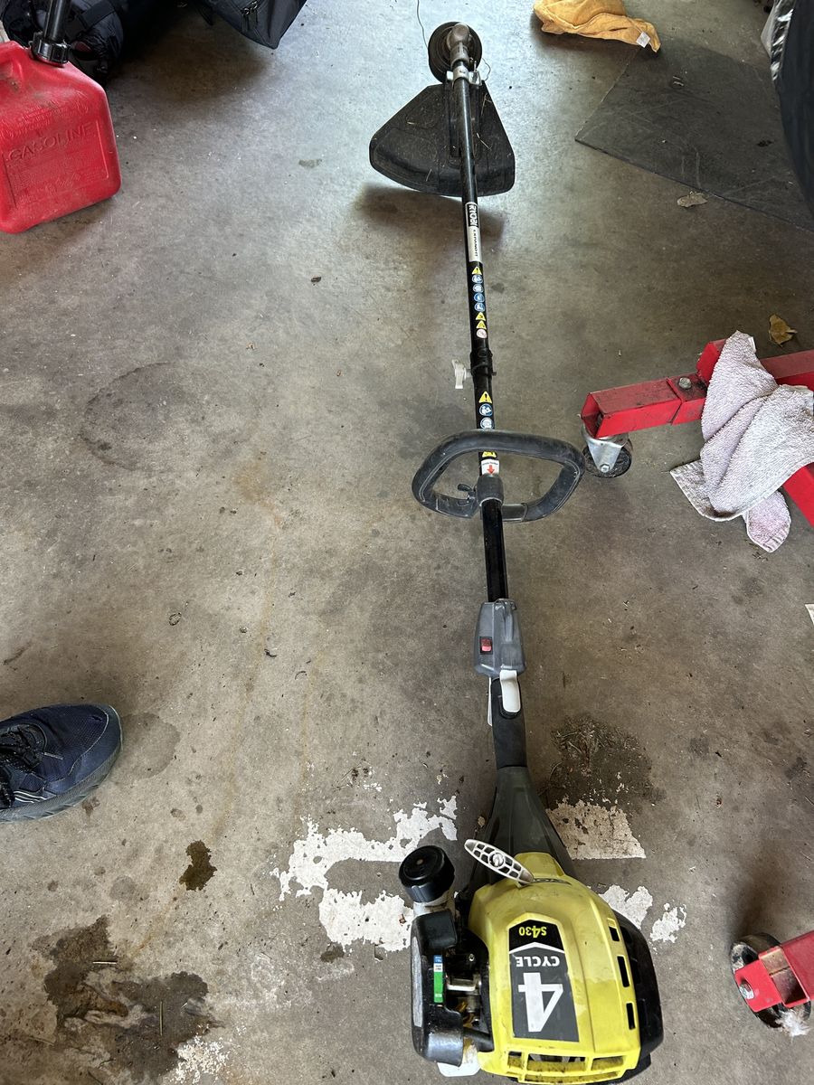 Ryobi extend it string trimmer 4 cycle