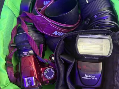Nikon D3300 in red with 2 lens and speed light flash
