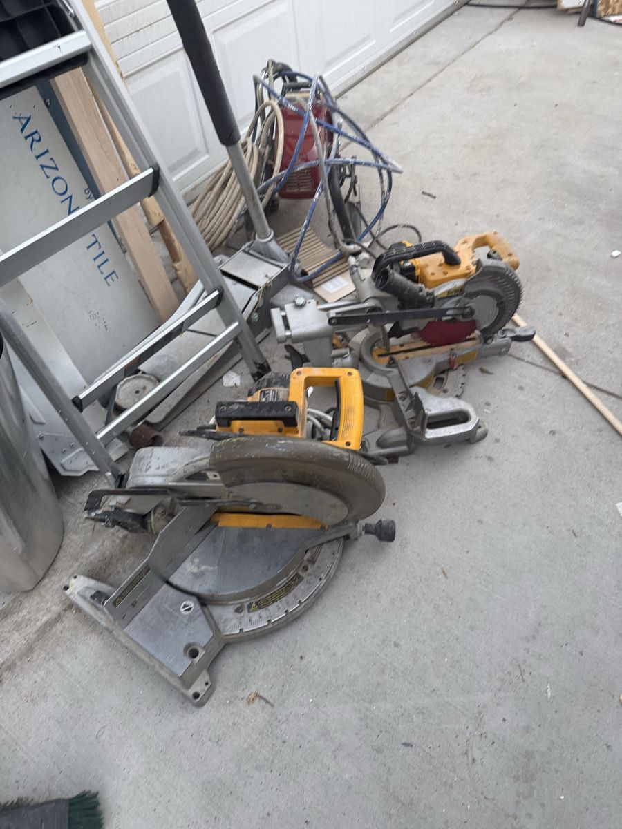 DEWALT 12” electric compound mitter saw.