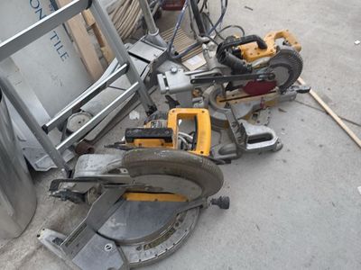 DEWALT 12” electric compound mitter saw.