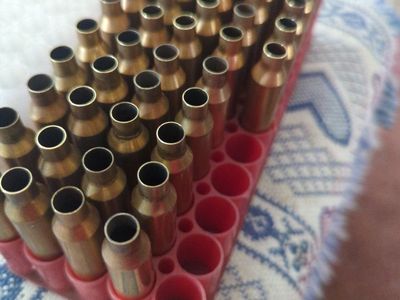 7mm Rem Mag Brass Casings in bag. Mixed manufacturers, deprimed and ready to process. 55 count.