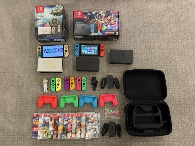 Double Nintendo Switch Bundle (Zelda OLED, Mario Kart Switch versions), 3 docks, 12 Games, 6 extra Joy-Cons & more!