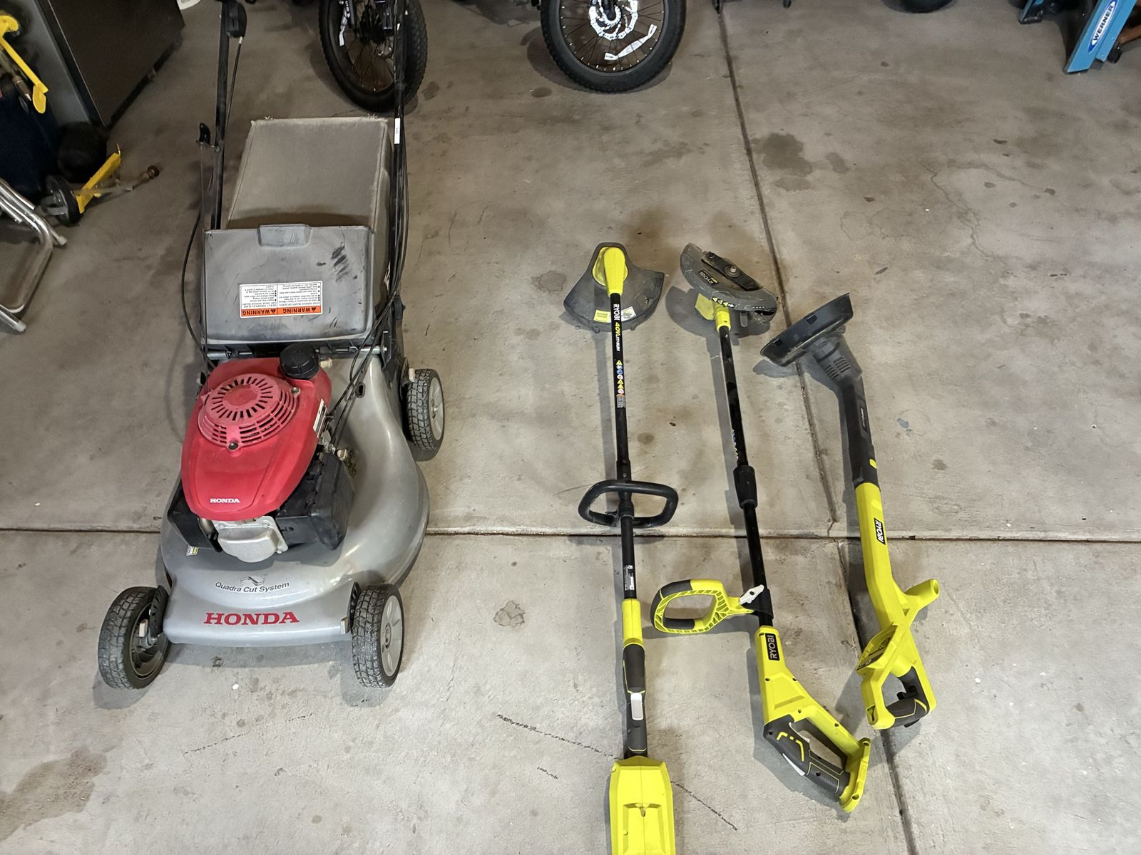 Honda lawn mower and cordless weed eater 