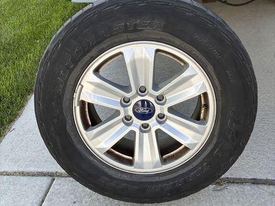 2016 Ford F-150 XLT Stock Wheels & Motomaster Total Terrain A/T3 Tires (2 good, 2 worn)