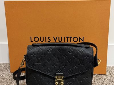 Louis Vuitton Pochette Métis in Black Monogram Empreinte Leather