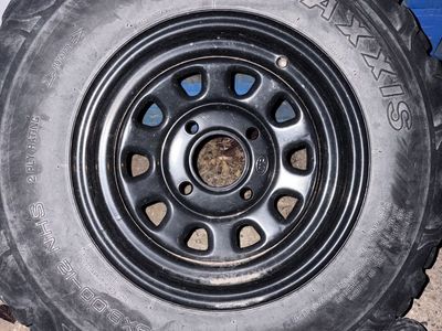Maxxis 25x8.00-12 NHS ATV Tire Mounted on Black Steel Wheel Rim $75 OBO