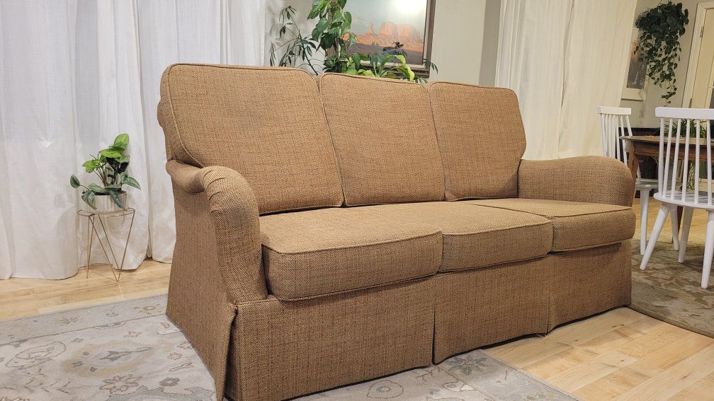 Brown fabric couch sofa