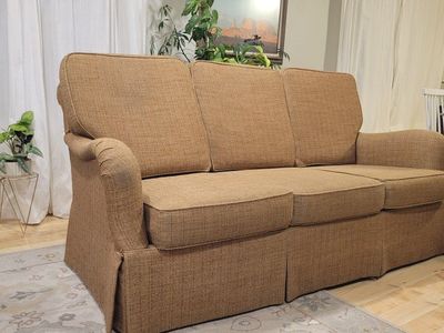 Brown fabric couch sofa