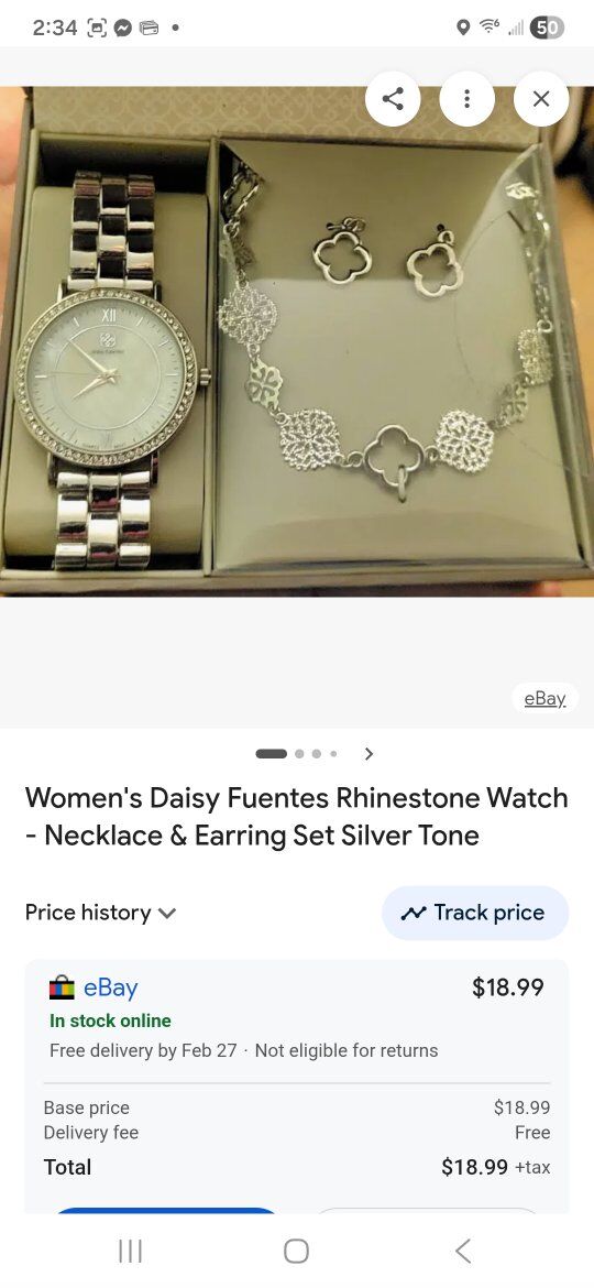 Daisy Fuentes watch/ necklace and earrings setset