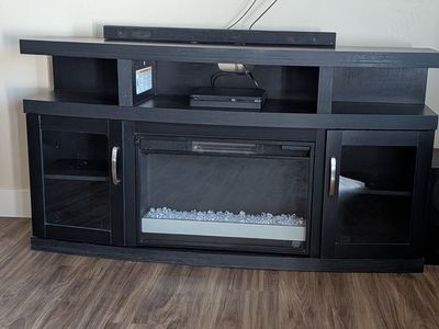 Black TV stand with Faux Fireplace