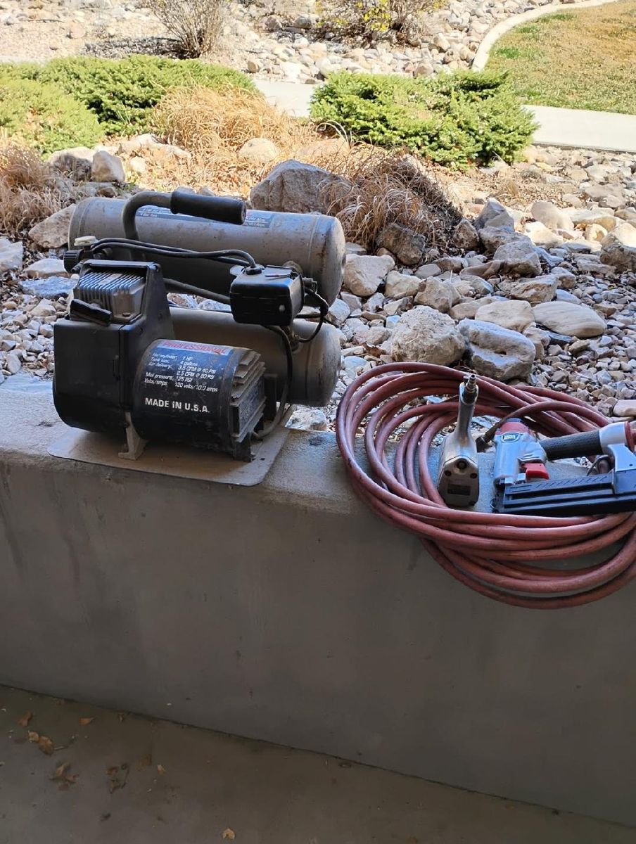 Campbell air compressor with accessories