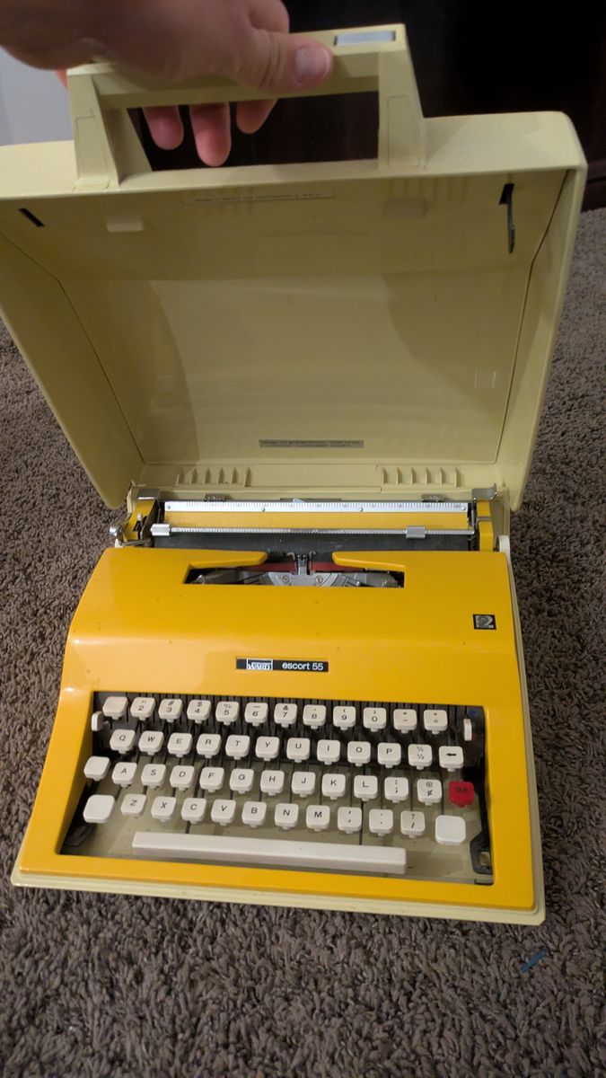 1970s Montgomery Ward (Olivetti) Escort 55 Vintage Yellow Typewriter With Case
