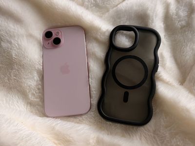 Pink Apple iPhone with Black Wavy MagSafe Phone
