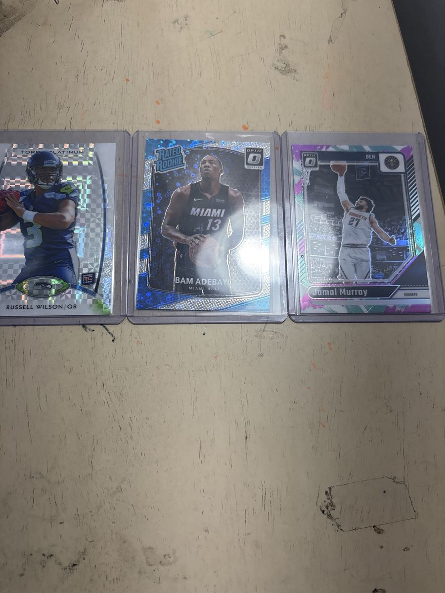 Optic donruss disco rated rookie bam adebayo, Russel Wilson rookie x fractor, Jamal Murray jazz short print