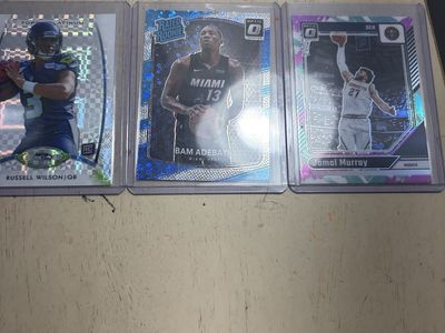 Optic donruss disco rated rookie bam adebayo, Russel Wilson rookie x fractor, Jamal Murray jazz short print