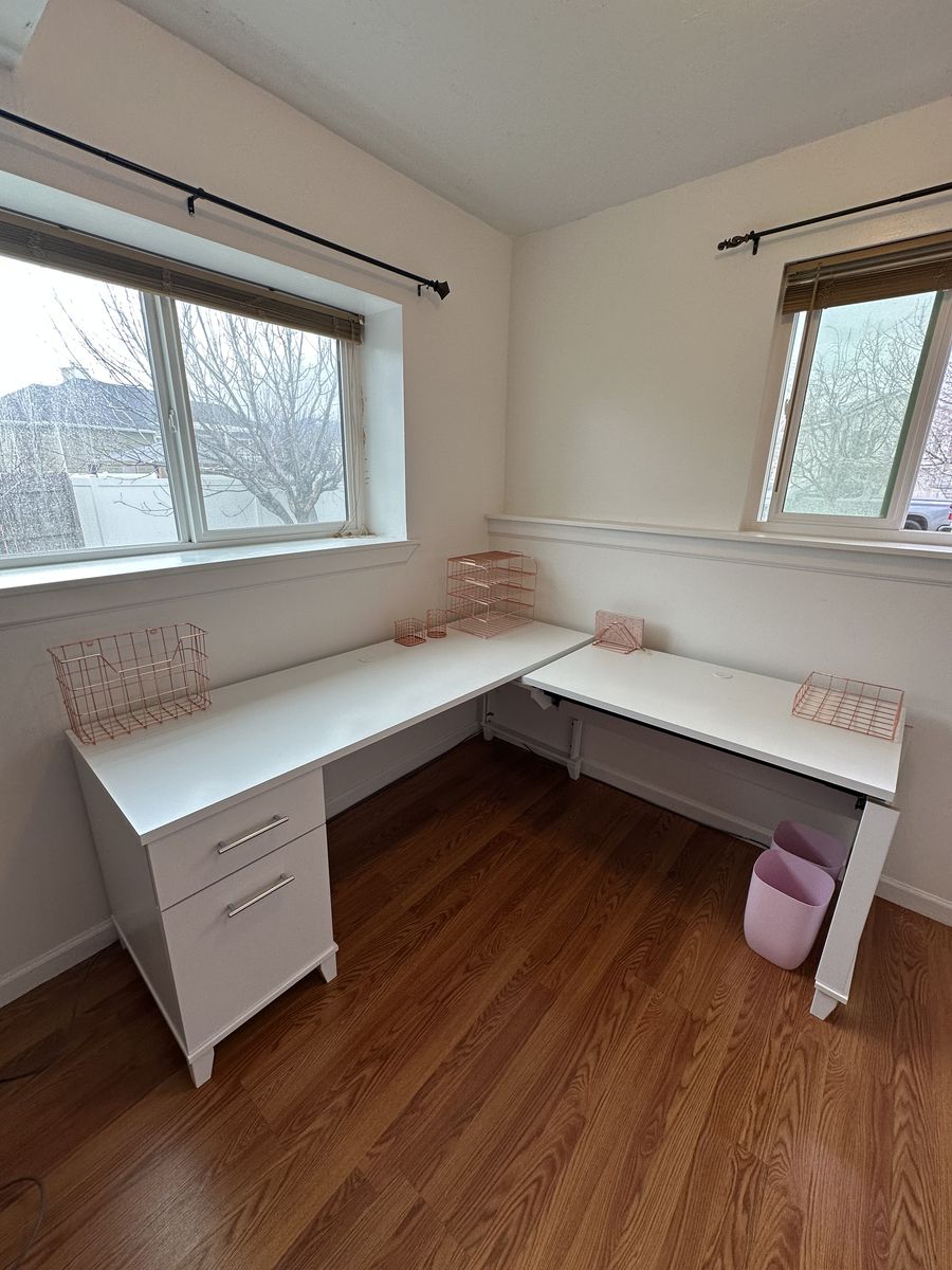 White L-Shaped Sit/Stand Desk – $200