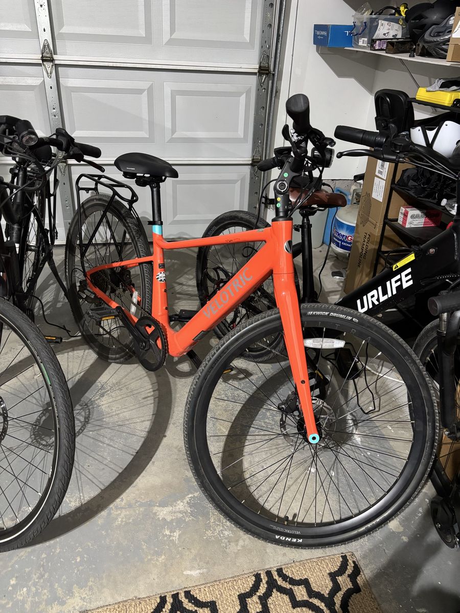 Velotric Discover 1 Step-Thru Electric Bike - Coral / Orange (306 Miles)
