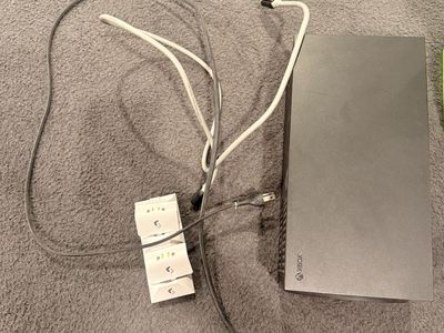 Xbox series x console with cords and games, charging batteries, 2 controllers.