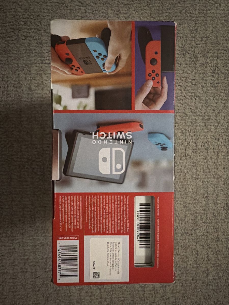 Nintendo Switch Console with Neon Blue and Neon Red Joy-Con in Original Box