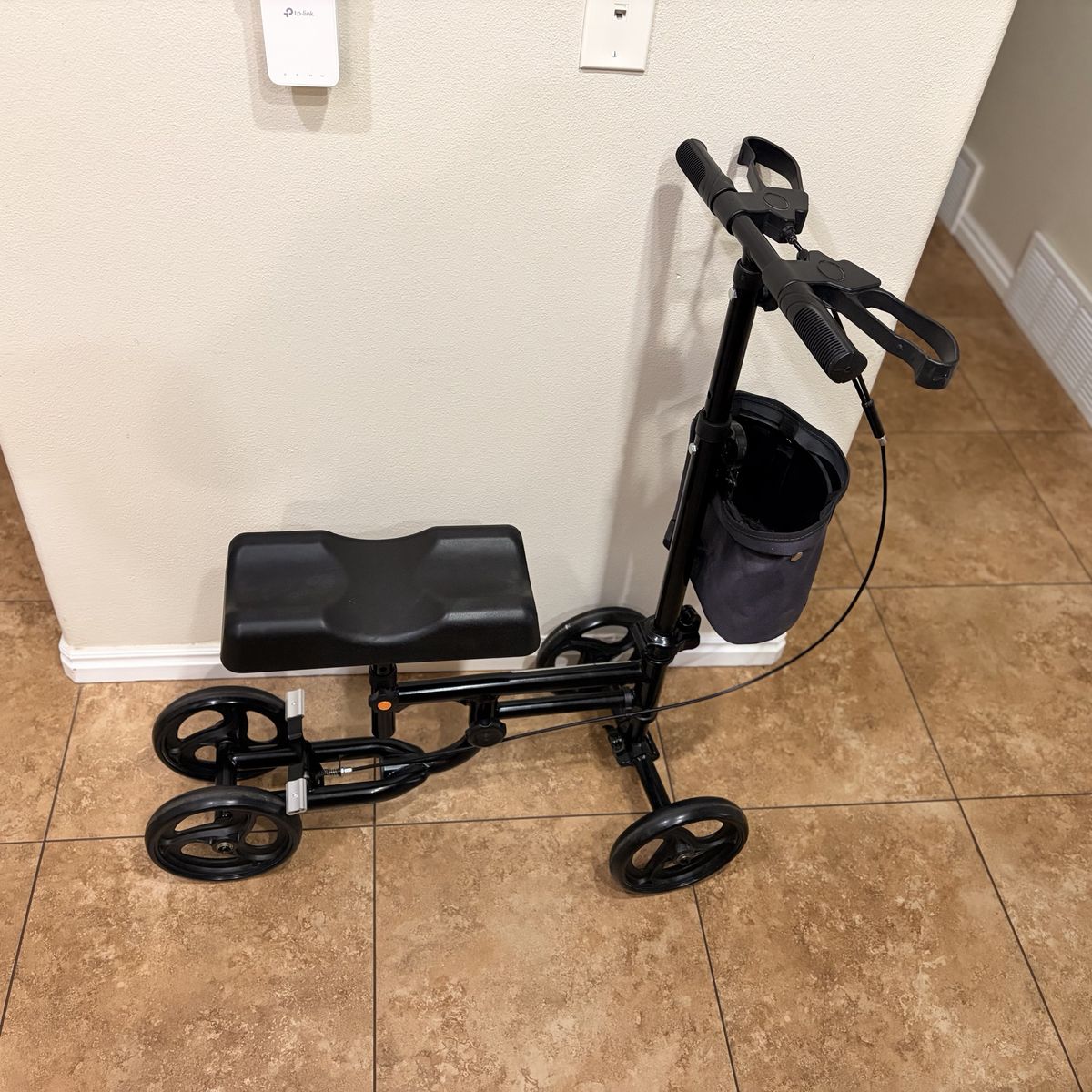 Black Steerable Knee Walker Scooter with Hand Brakes and Storage Basket