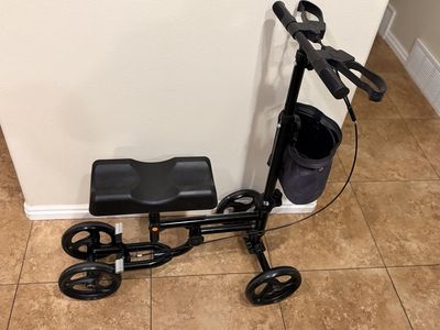 Black Steerable Knee Walker Scooter with Hand Brakes and Storage Basket