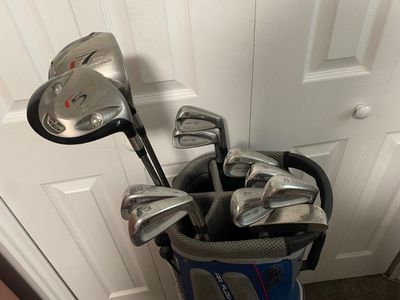 Full set of higher-end golf clubs with bag.