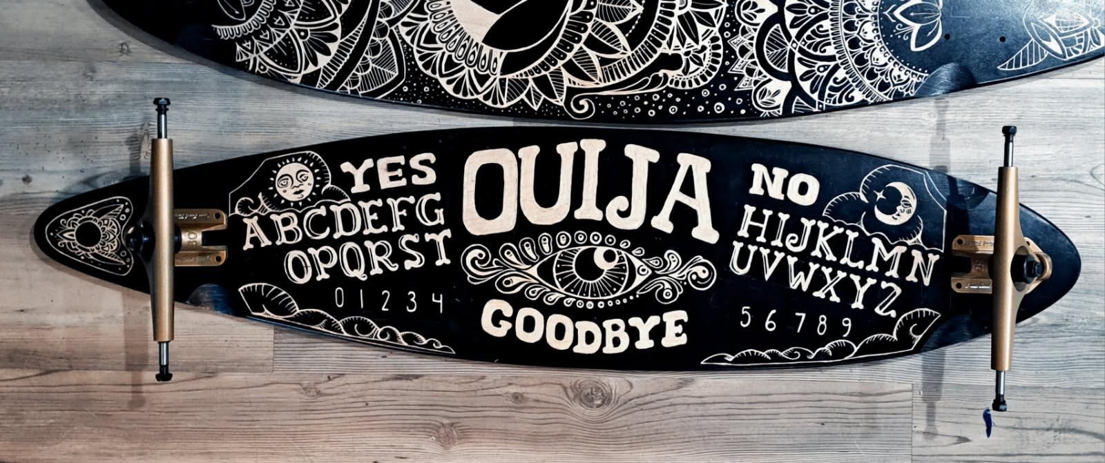 Custom engraved pintail longboard