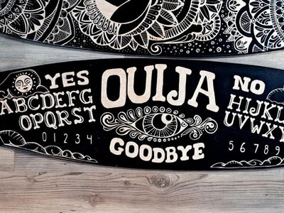 Custom engraved pintail longboard
