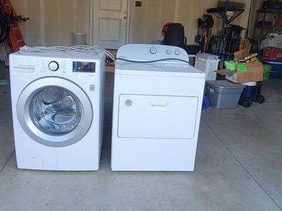 LG Front Load Washing Machine & Whirlpool Electric Dryer - White